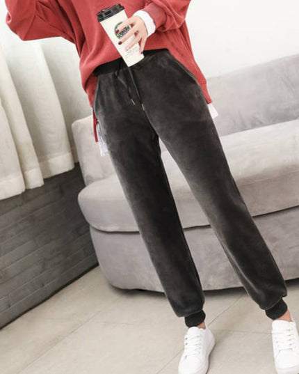 Damskie zimowe spodnie welurowe dresy ocieplane