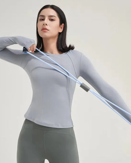 Sportowa koszulka damska o dopasowanym kroju, z długim rękawem
