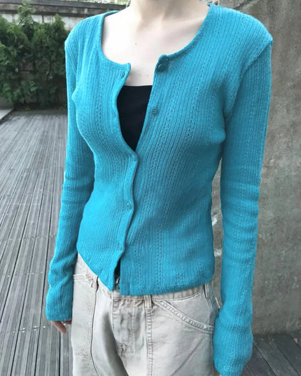 Damski sweter rozpinany w paski – marynarski styl