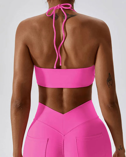 Sportowy top damski z przedłużanym przodem