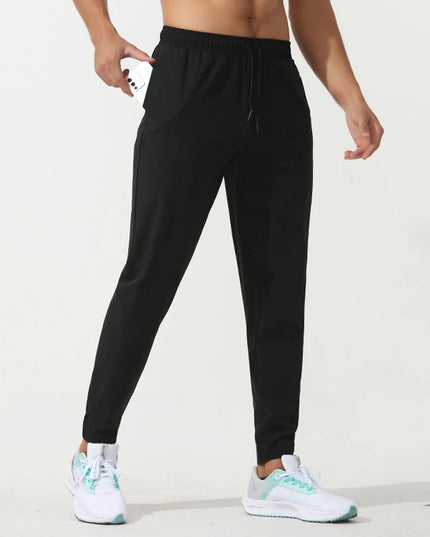 Sportowe dresy męskie elastyczne z dodatkową kieszonką