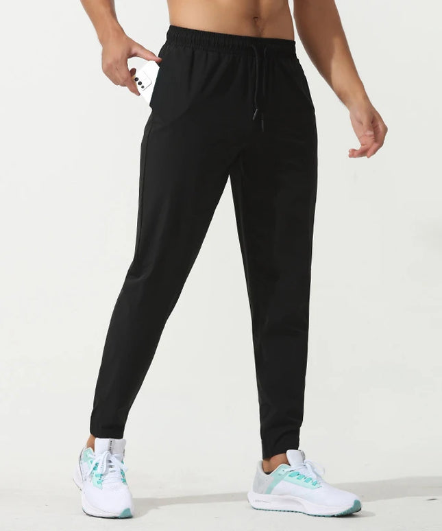 Sportowe dresy męskie elastyczne z dodatkową kieszonką