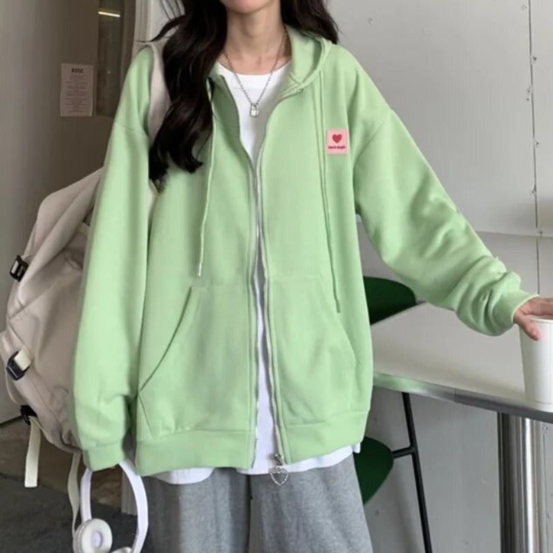 Damska bluza oversize z motywem w serca