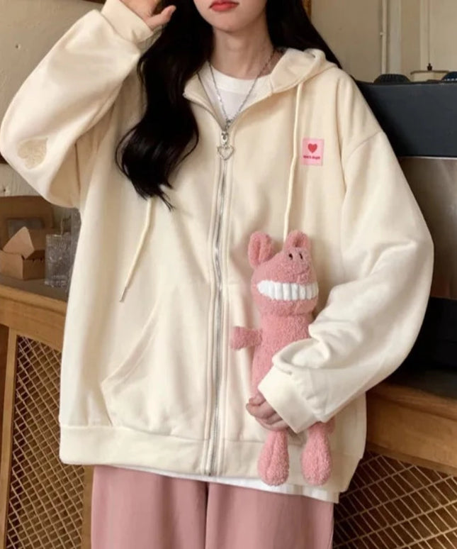 Damska bluza oversize z motywem w serca