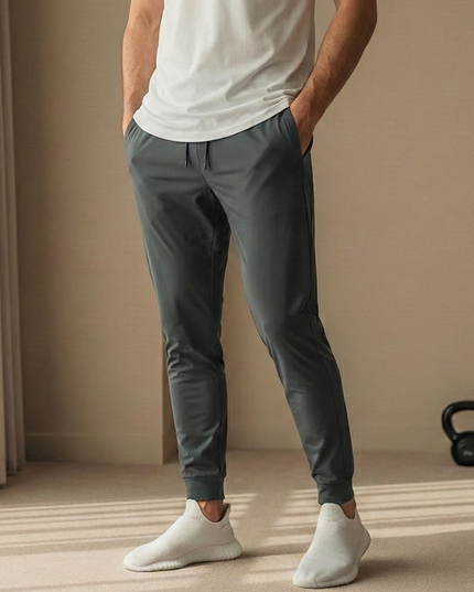 Sportowe dresy męskie elastyczne ze zwężaną nogawką