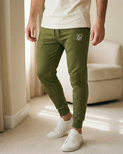 Sportowe dresy męskie ze zwężaną nogawką i kieszeniami