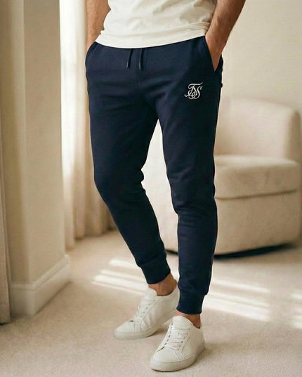 Sportowe dresy męskie ze zwężaną nogawką i kieszeniami