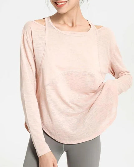 Sportowa koszulka damska z długim rękawem o luźnym kroju