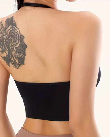 Sportowy biustonosz z mocno wyciętym dekoltem i mocowaniem na karku