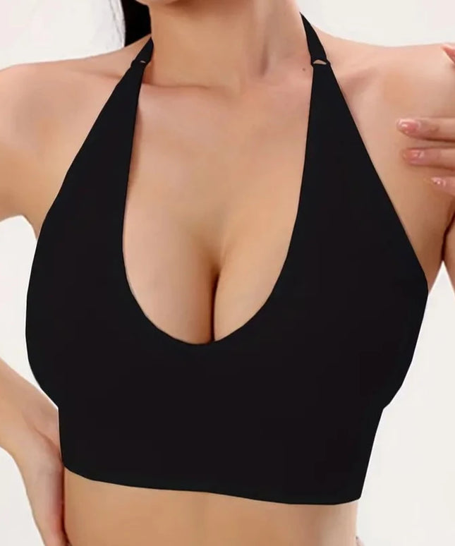 Sportowy biustonosz z mocno wyciętym dekoltem i mocowaniem na karku