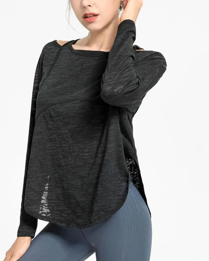 Sportowa koszulka damska z długim rękawem o luźnym kroju