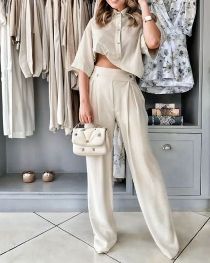Komplet damski z asymetryczną koszulą i garniturowymi spodniami
