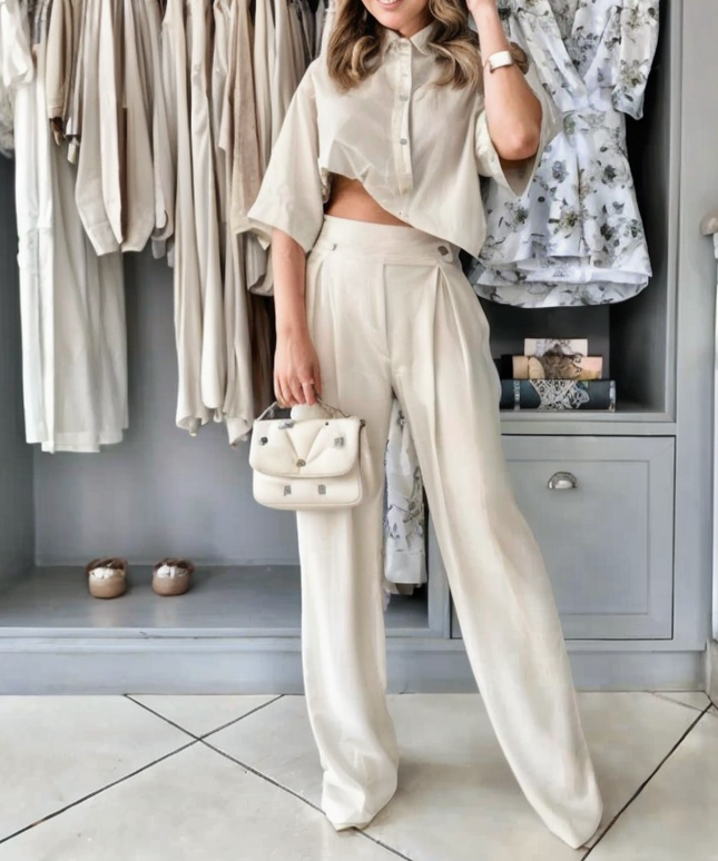 Komplet damski z asymetryczną koszulą i garniturowymi spodniami