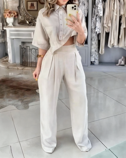 Komplet damski z asymetryczną koszulą i garniturowymi spodniami