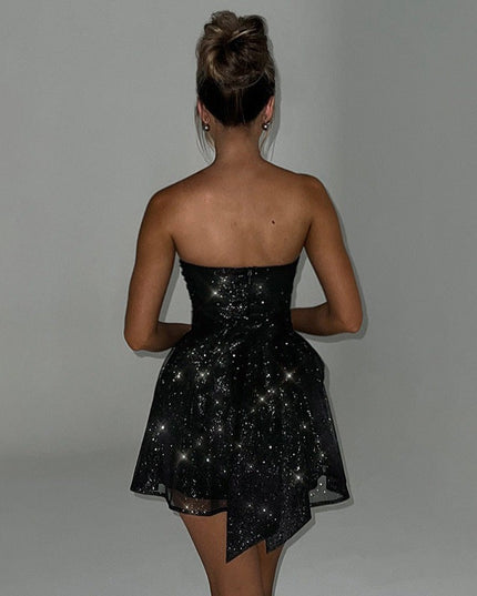 Sukienka mini błyszcząca z kokardą na plecach