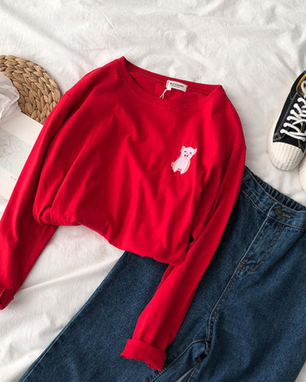 Damska koszulka z długim rękawem z naszywkami zwierzątek