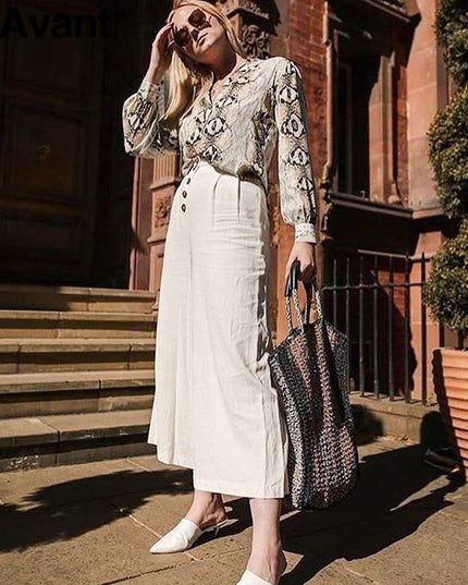 Damska koszula z długim rękawem we wzór skóry węża