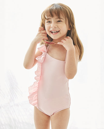 Jednoczęściowy strój kąpielowy dla dziewczynki na ramiączkach z falbankami i kokardą
