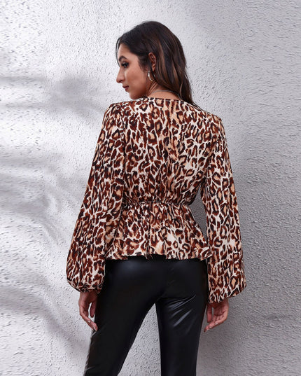 Damska koszulka z długim rękawem we wzory z falbanką