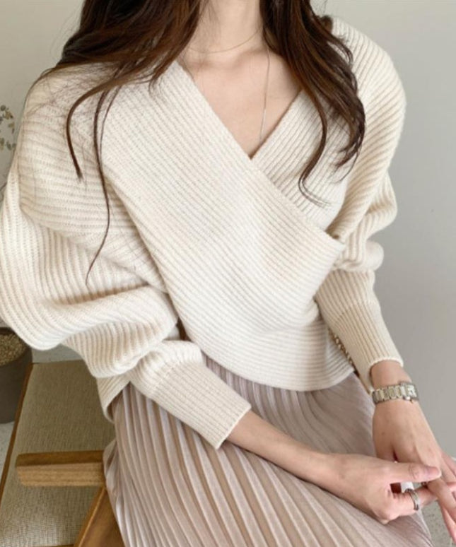 Damski sweter dziergany astymetryczny z bufiastymi rękawami