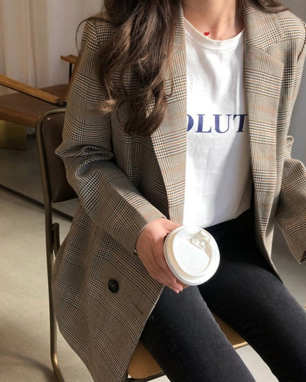 Damski płaszcz w kratkę