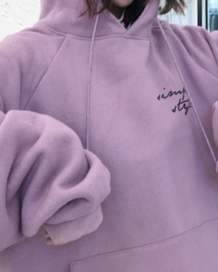 Damska bluza oversize z kapturem z napisem na plecach