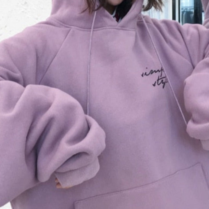 Damska bluza oversize z kapturem z napisem na plecach