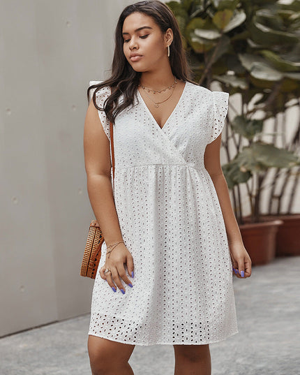 Sukienka plus size ażurowa przed kolano