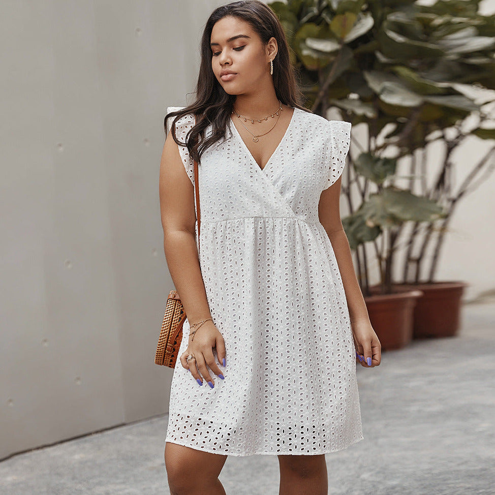 Sukienka plus size ażurowa przed kolano