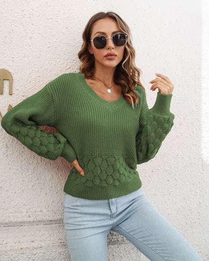 Damski sweter dziergany z dekoltem w serek