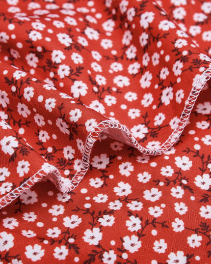 Sukienka czerwona mini w kwiatki zapinana na guziki