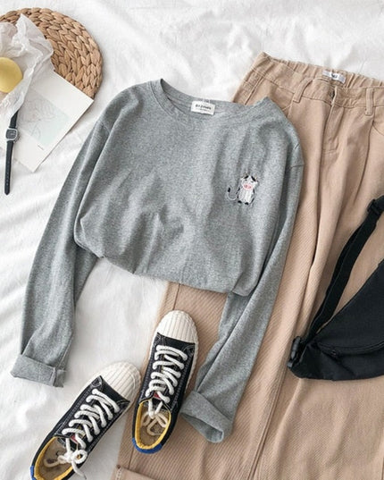 Damska koszulka z długim rękawem z naszywkami zwierzątek