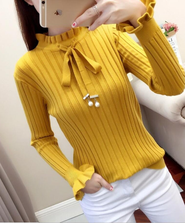 Damski sweter dziergany wykończony falbanką