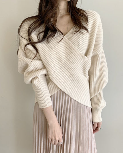 Damski sweter dziergany astymetryczny z bufiastymi rękawami