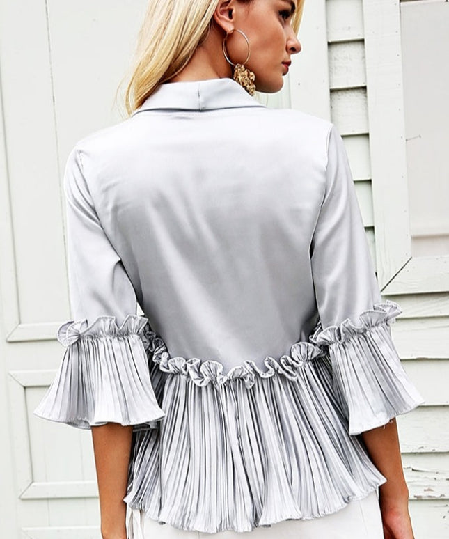 Damska koszulka z długim rękawem z satynowej tkaniny i falbankami