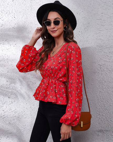 Damska koszulka z długim rękawem we wzory z falbanką