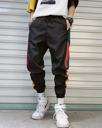 Męskie spodnie treningowe z kolorową lamówką