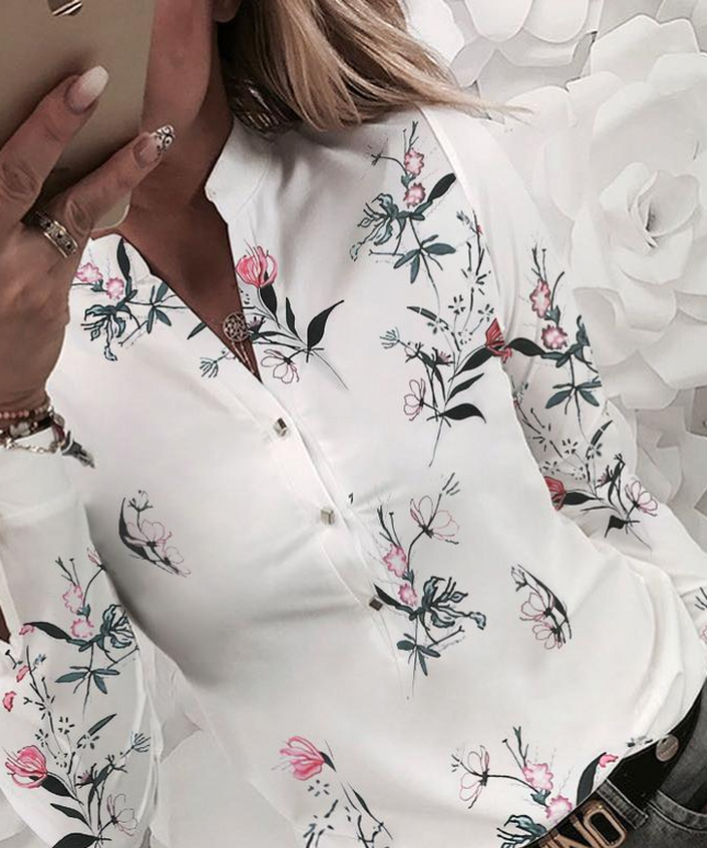 Damska koszulka z długim rękawem w kwiaty zapinana na guziki
