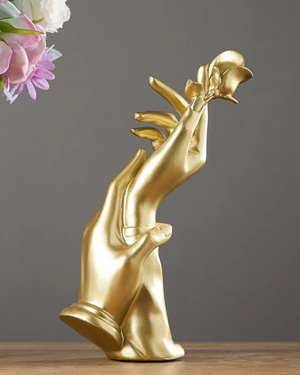 Figurka dekoracyjna dłoń złoto