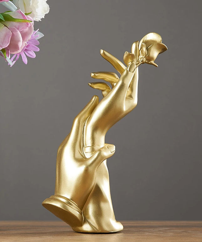 Figurka dekoracyjna dłoń złoto