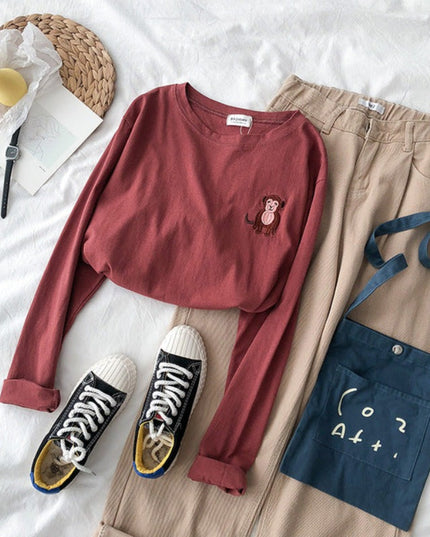 Damska koszulka z długim rękawem z naszywkami zwierzątek