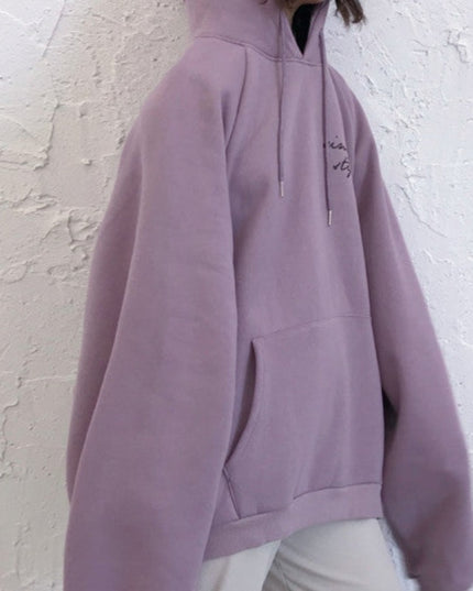 Damska bluza oversize z kapturem z napisem na plecach