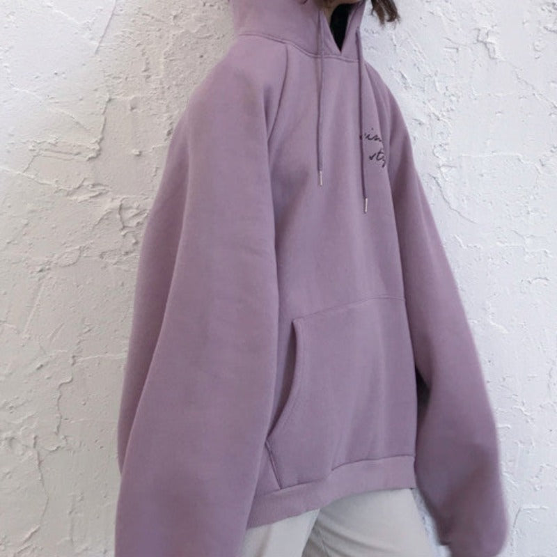 Damska bluza oversize z kapturem z napisem na plecach