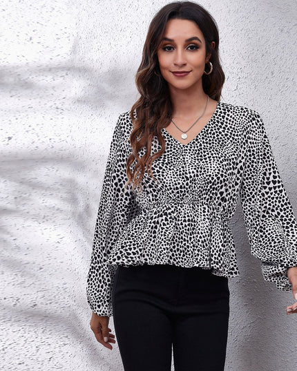 Damska koszulka z długim rękawem we wzory z falbanką