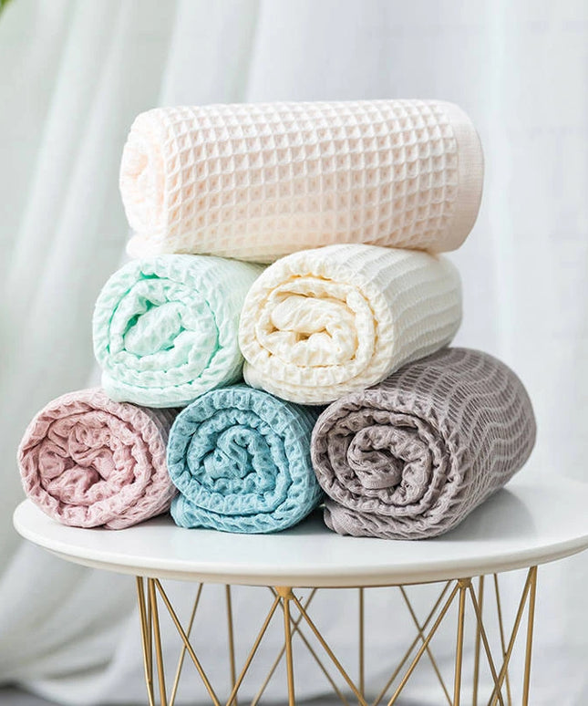Ręcznik saunowy bawełniany struktura wafla w jasnych kolorach