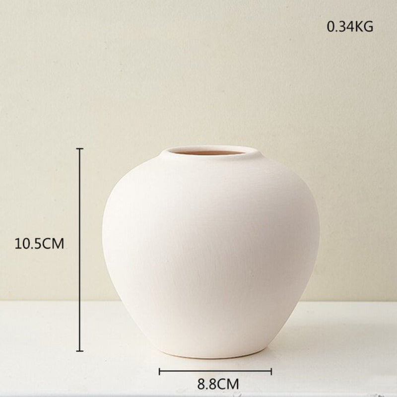 Wazon ceramiczny w jasnych kolorach reguralne kształty
