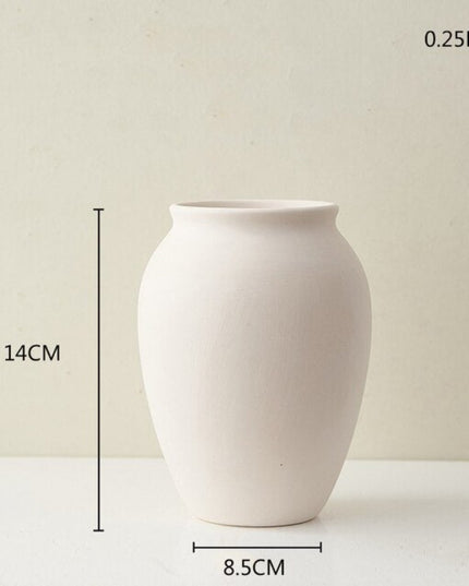 Wazon ceramiczny w jasnych kolorach reguralne kształty