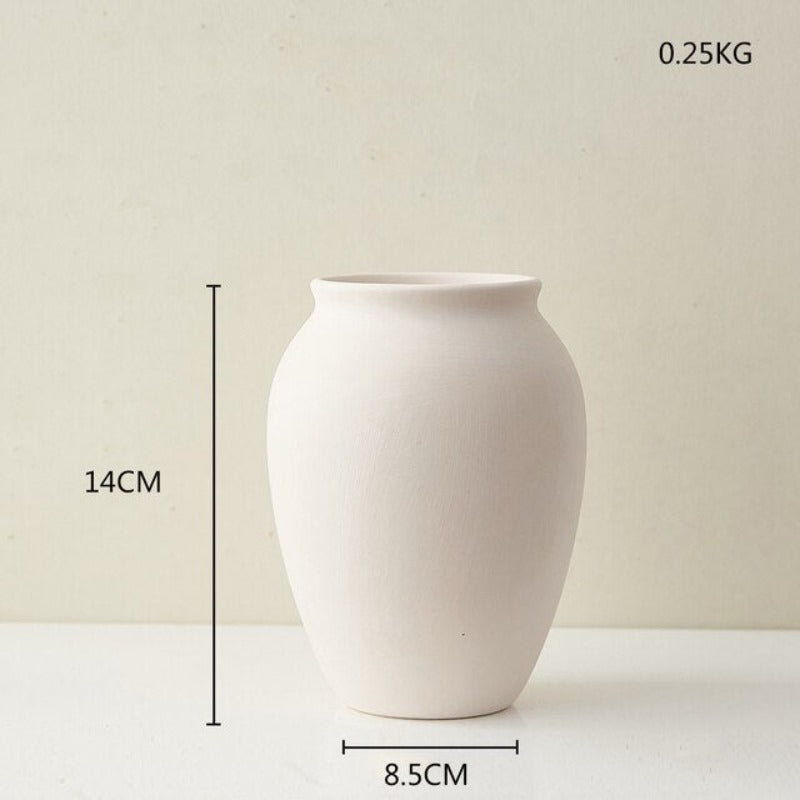 Wazon ceramiczny w jasnych kolorach reguralne kształty