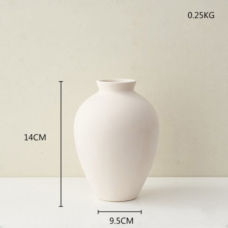 Wazon ceramiczny w jasnych kolorach reguralne kształty