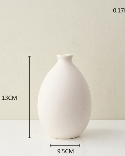 Wazon ceramiczny w jasnych kolorach reguralne kształty